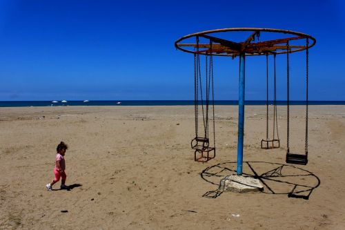 swing child beach