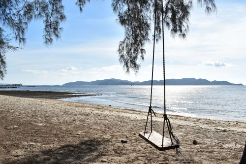 swing beach sky