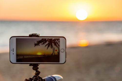 Taking Photo Of Sunset