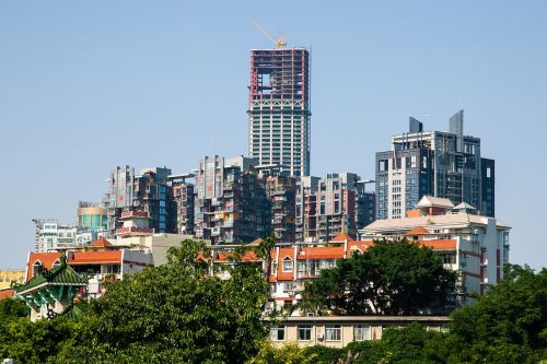 tall buildings house red tile