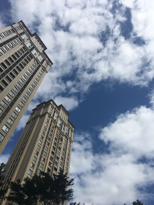 tall buildings look blue sky