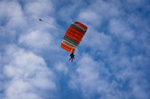 tandem jump parachute clouds