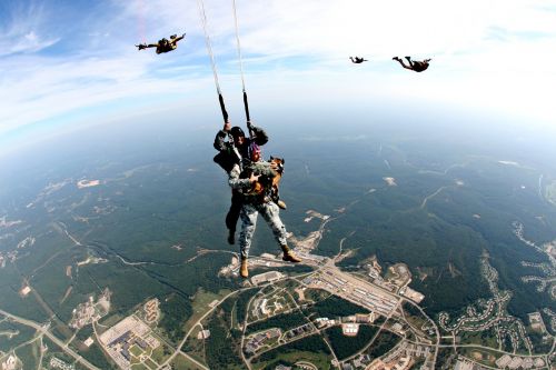 tandem skydivers skydivers teamwork