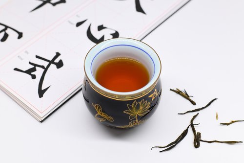 tea cup  copybook  pu-erh tea