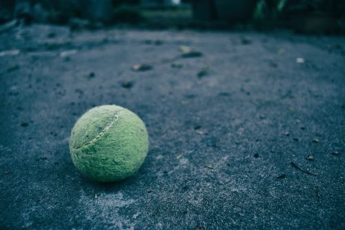 tennis ball tennis soil