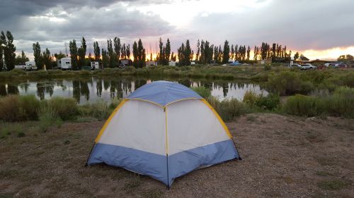 tent sunset lake