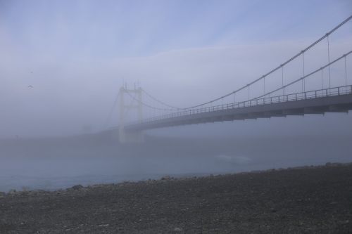 the bridge in fog river iceland