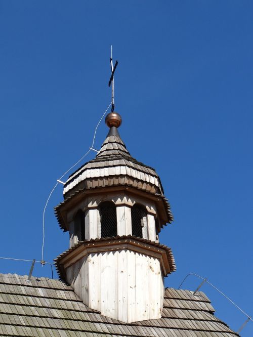 the church tower tower the roof of the