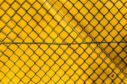 the fence the grid yellow