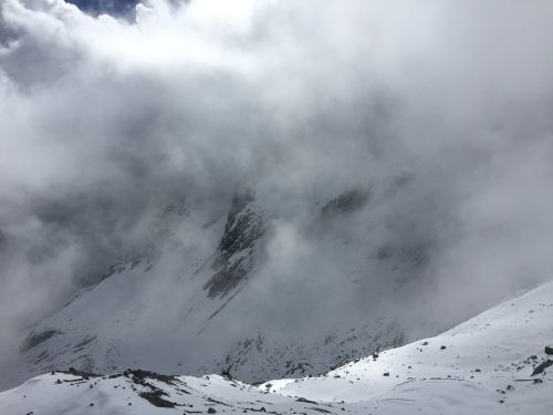 the jade dragon snow mountain cloud foggy road