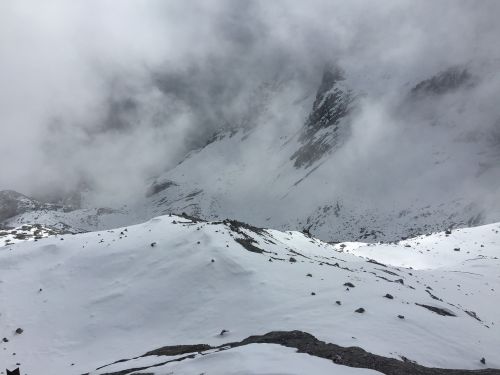 the jade dragon snow mountain cloud foggy road