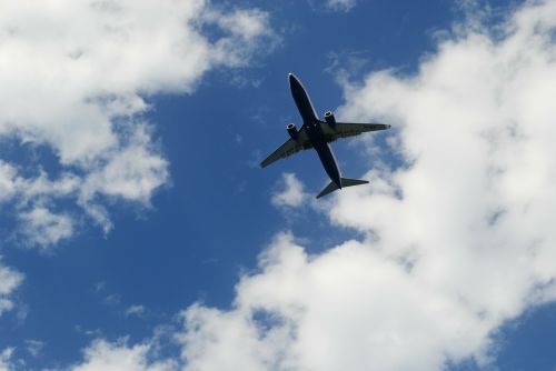 the plane clouds sky