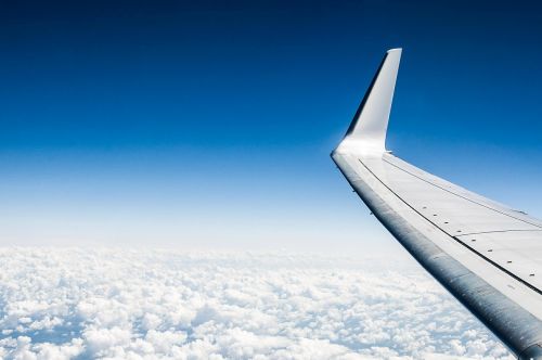 the plane wing clouds