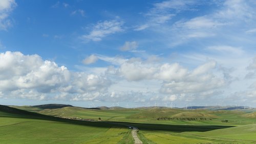 the prairie the blue sky and white clouds weather color  tourism  mongolia