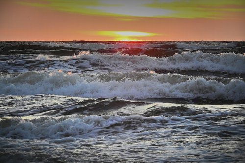 the waves  sea  sunset