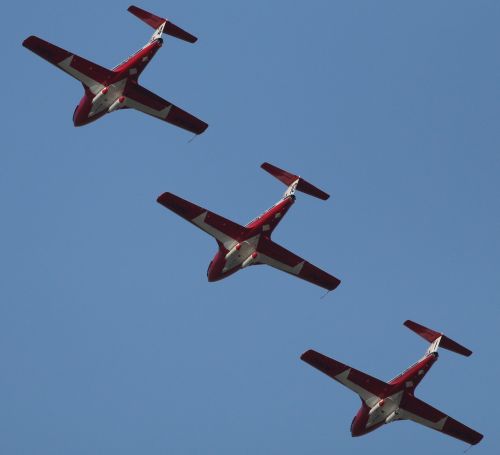 three planes snowbirds jets