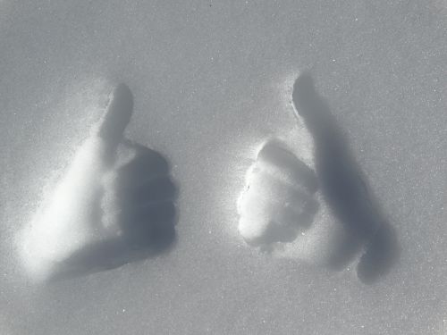 thumbs up snow tracks finger high