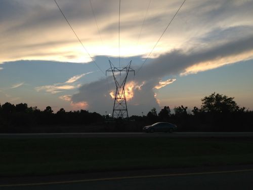 thunderstorm sunset power lines