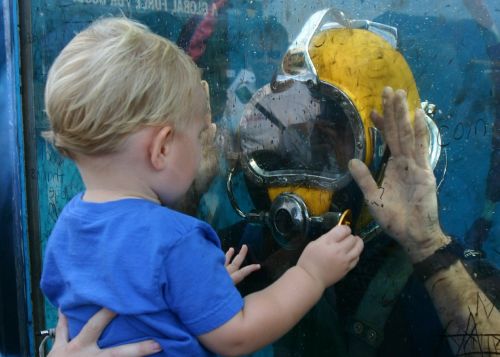 toddler scuba diver glass tank