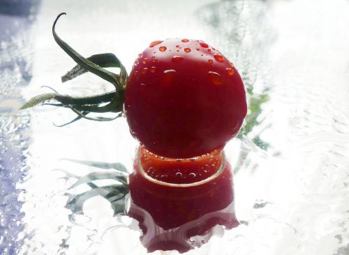 tomato in the water washed drop of water