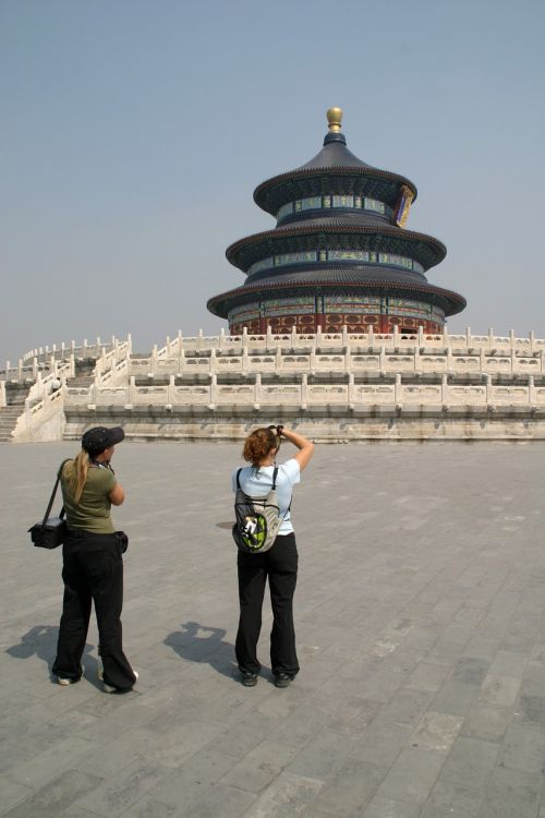 tourists peace stamp beijing