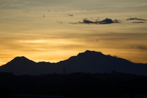 towards the sun early in the morning mountain