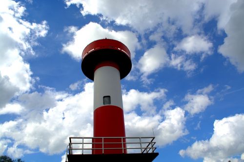 tower sky clouds