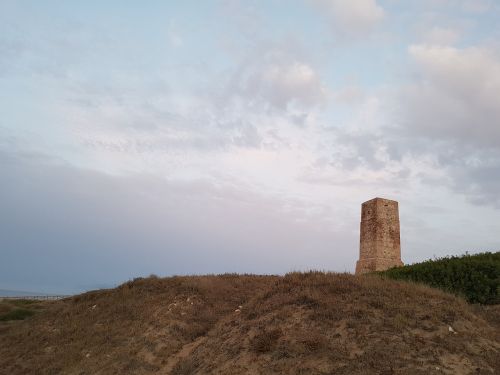 tower clouds dawn