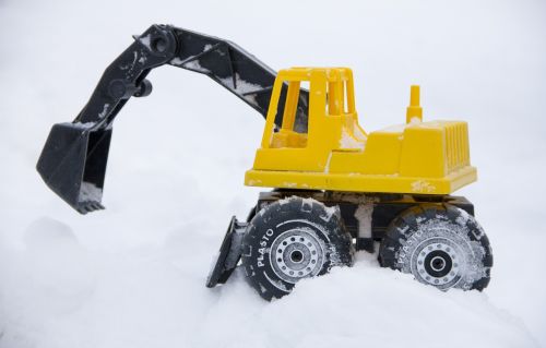 toy excavator snow
