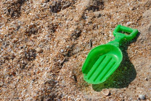 toy shovel beach left behind