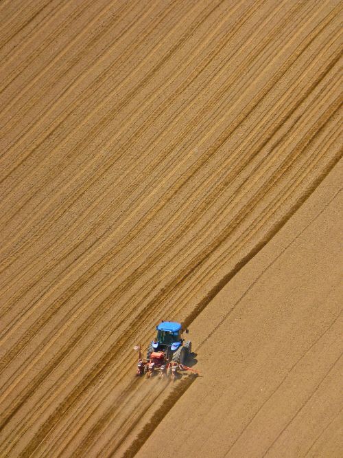 tractor ploughing field