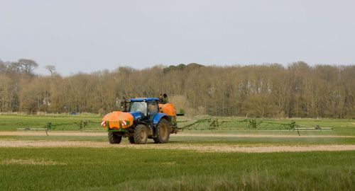 tractor spraying crop spraying