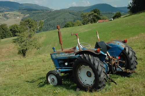 tractor alpine pasture meadow