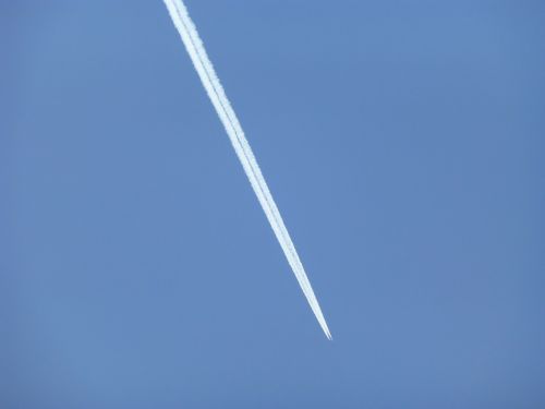 trail airplane blue sky