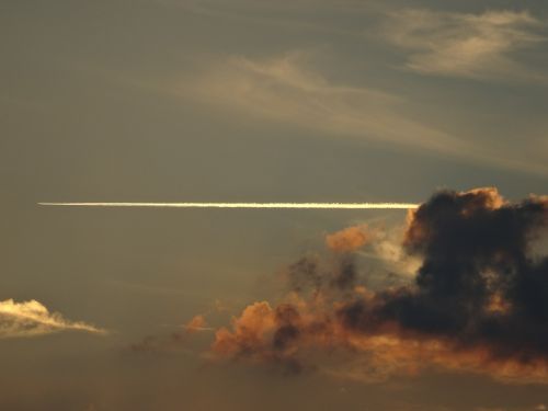 trail plane sunset