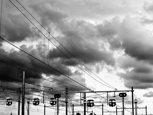 train wires clouds