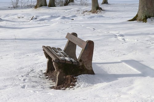 tranquility base  snow  wooden bench