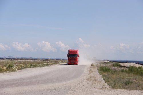 transport  truck  dust cloud