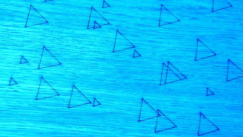 Triangles On Blue Background
