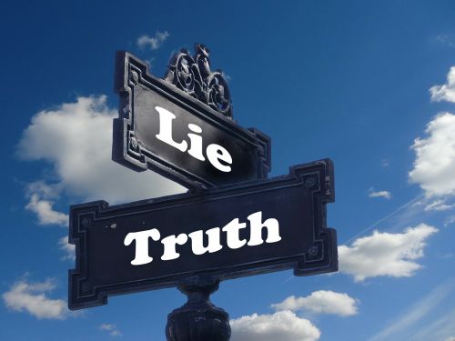 truth lie street sign