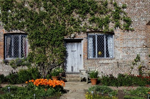 tudor cottage old brickwork leaded-light windows