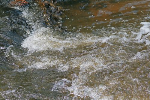 Tumbling Water In River
