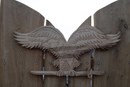 turul bird coat of arms carving