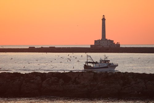 twilight  return of fishing  lighthouse
