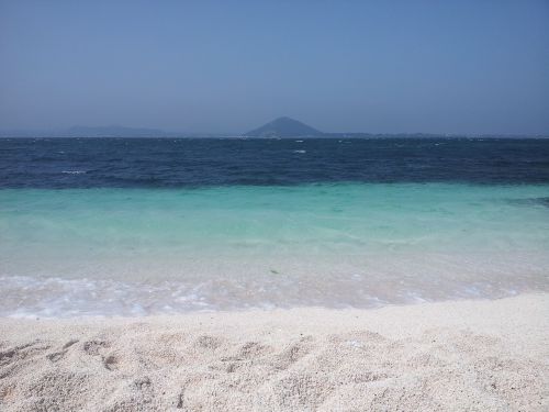 udo white sandy beach sea
