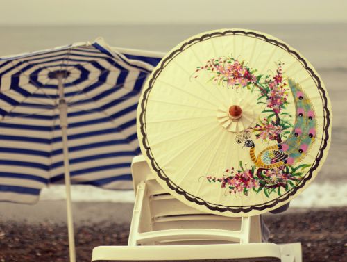 umbrella sunbeds coastal