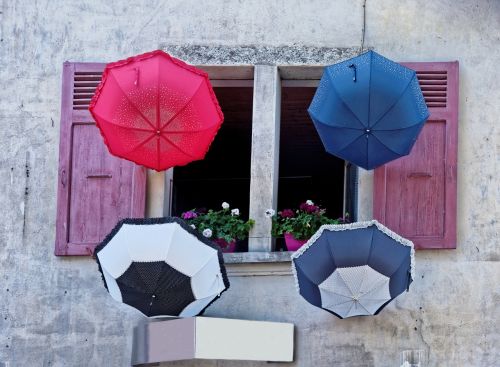 umbrellas window colorful