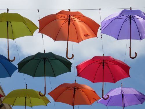 umbrellas sky colourful