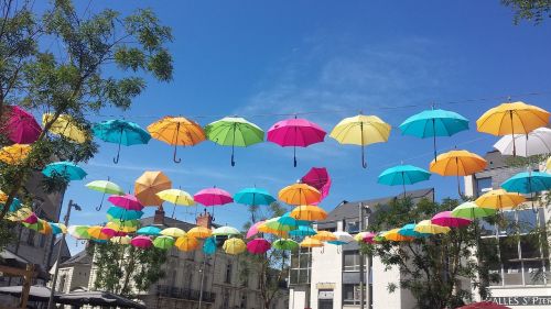 umbrellas summer blue sky