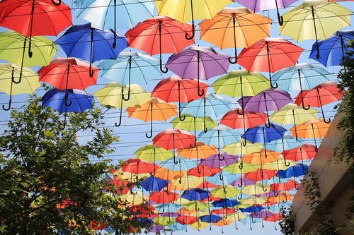 umbrellas  alley  sun